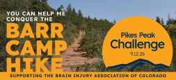 Image of Barr Trail in the forest of Pikes Peak with text that says "You can Help me conquer the Barr Camp Hike. Pikes Peak Challenge 9.12.26. Supporting the Brain Injury Association of Colorado"