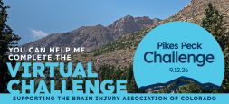 Image of sidewalk in Manitou Springs with text that says "You can Help me complete the Virtual Challenge. Pikes Peak Challenge 9.12.26. Supporting the Brain Injury Association of Colorado"